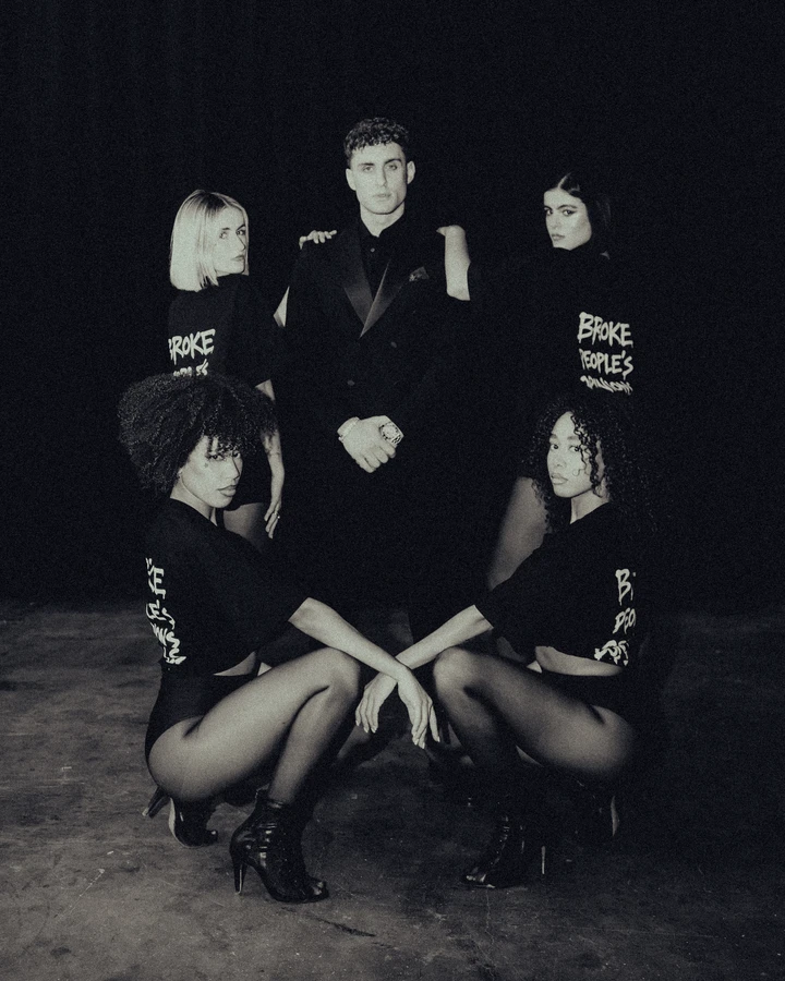 Models in fashion outfits, black and white picture