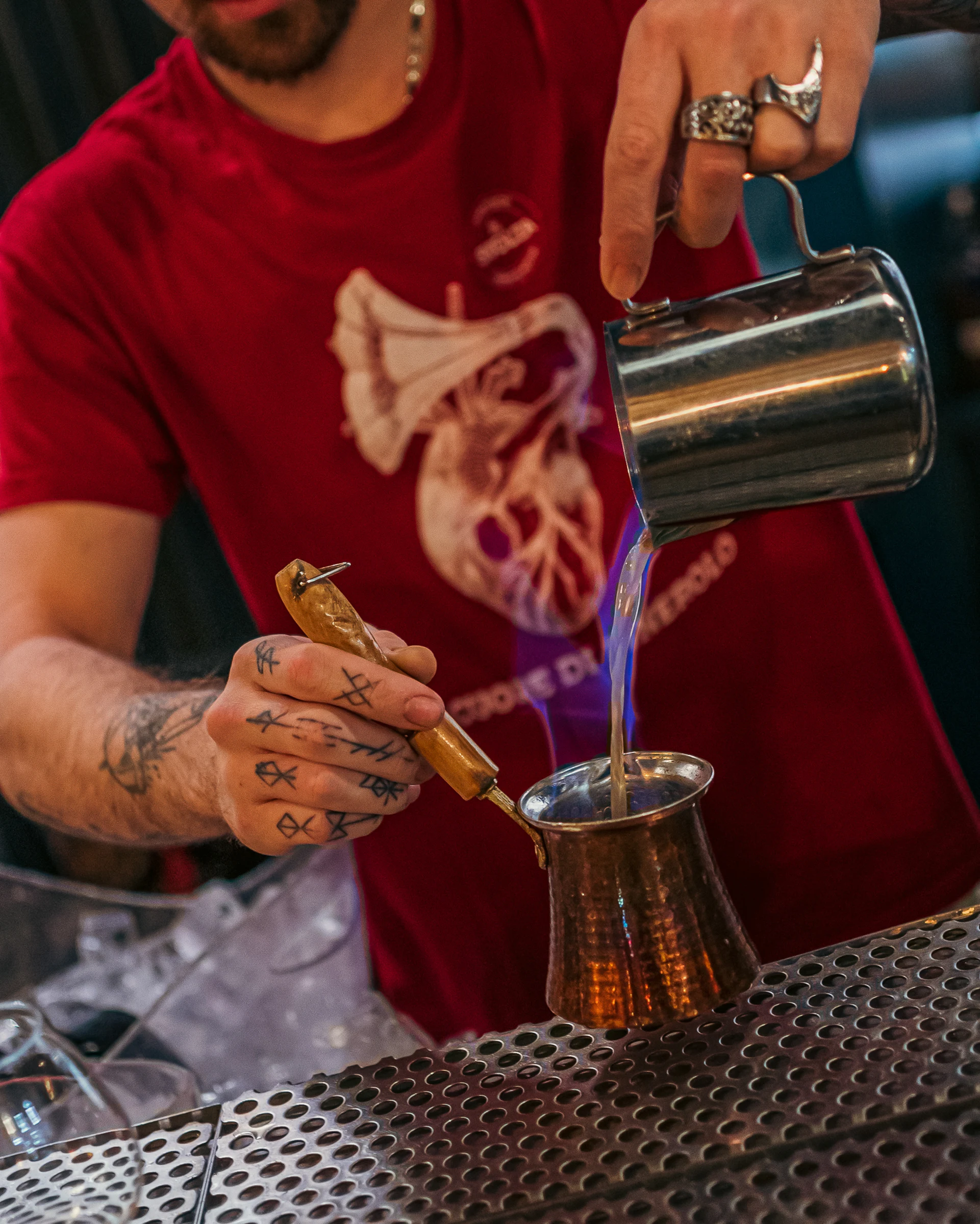 Bartender preparing a drink behind the bar