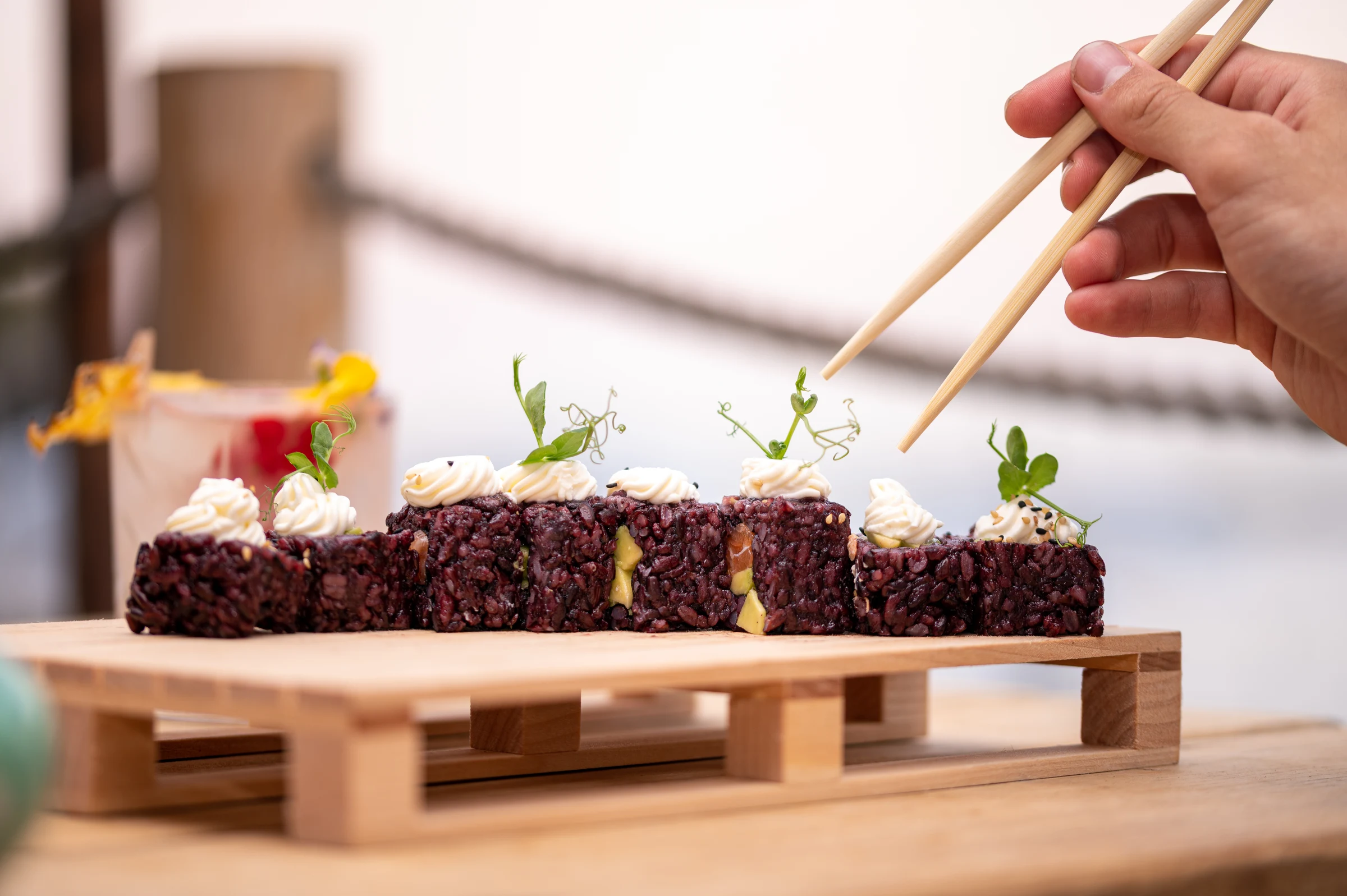 Selection of fine dining bites presented on a tray