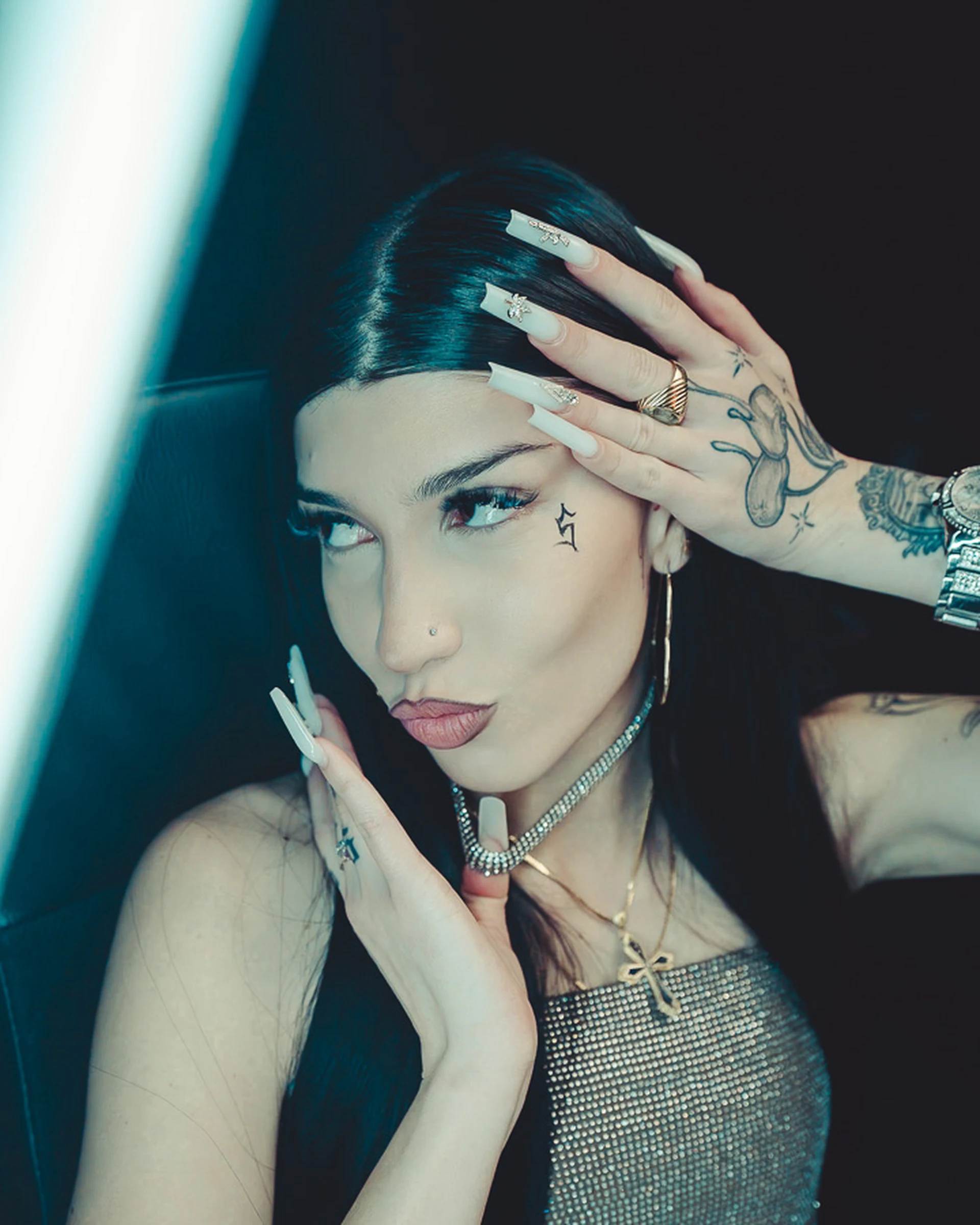 Female editorial portrait under blue light