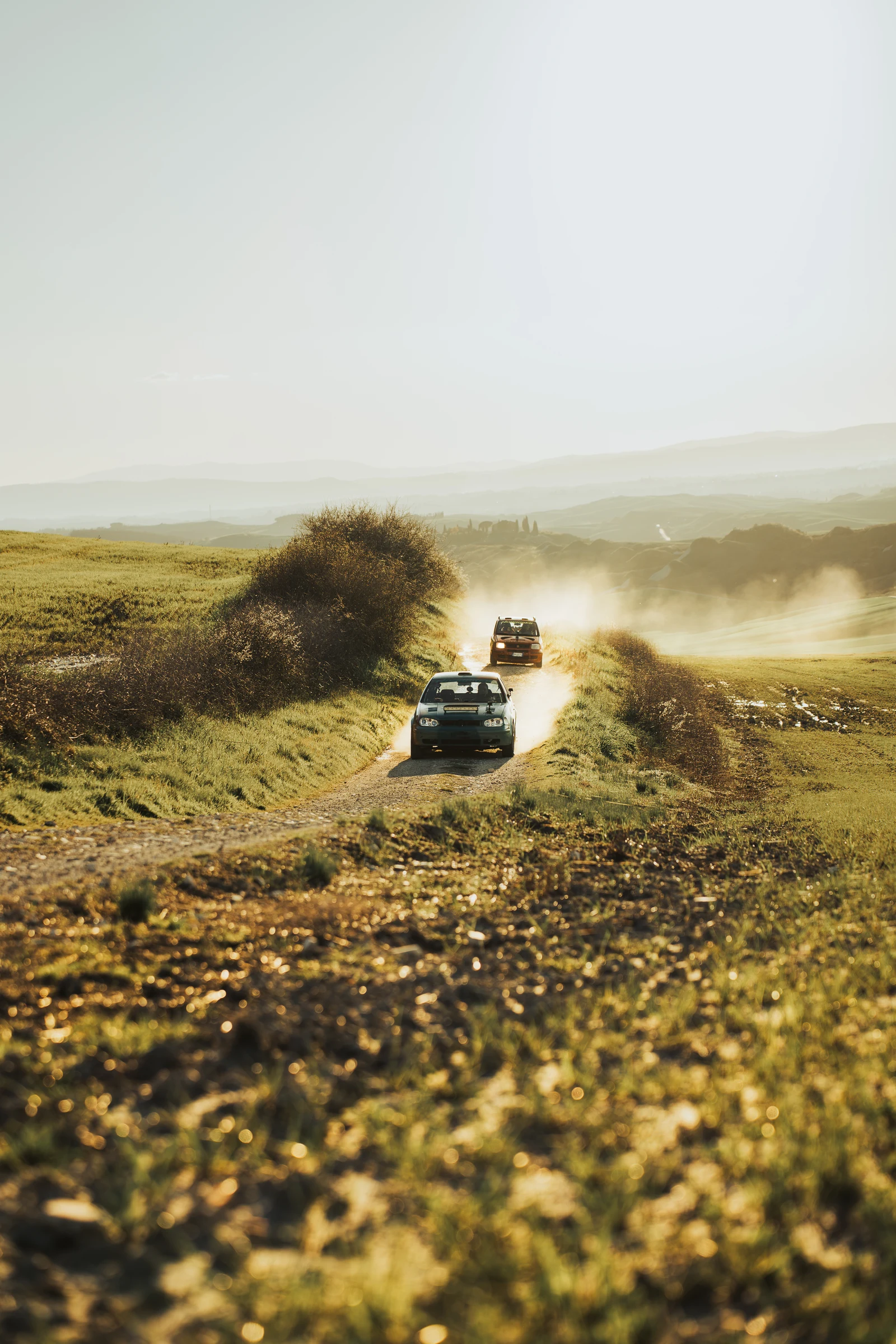 Off-road vehicle following a track through the countryside