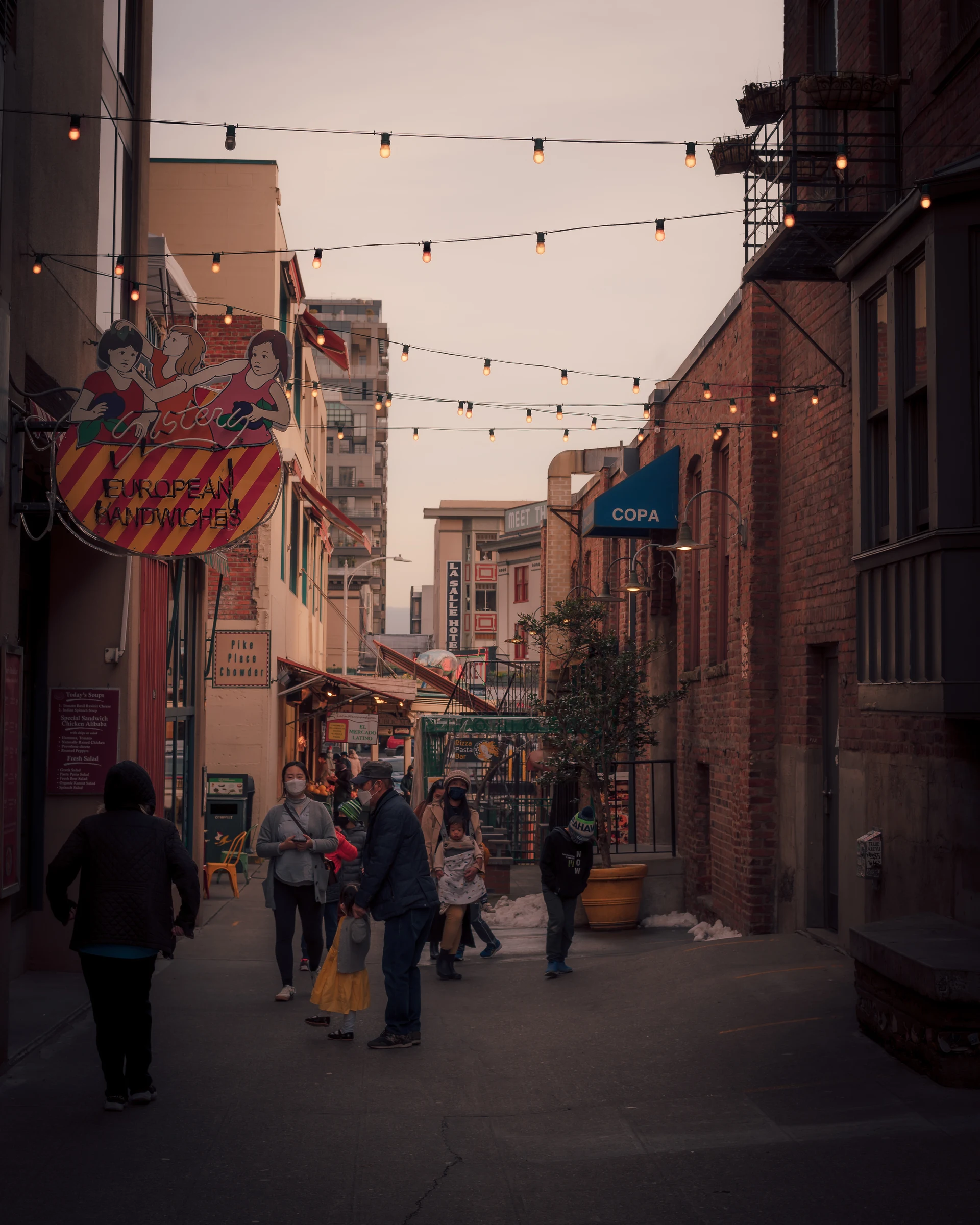 Pedestrian street decorated with bunting in a historic centre